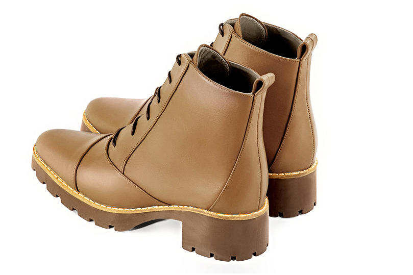 Camel beige women's ankle boots with laces at the front. Round toe. Low rubber soles. Rear view - Florence KOOIJMAN